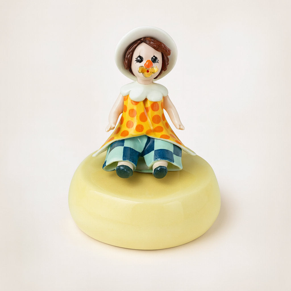 Clown con carillon Zampiva in porcellana base gialla H13 cm dipinto a mano Made in Italy