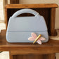 Dea Capodimonte borsetta grigia con farfalla ceramica 17×9×14 cm