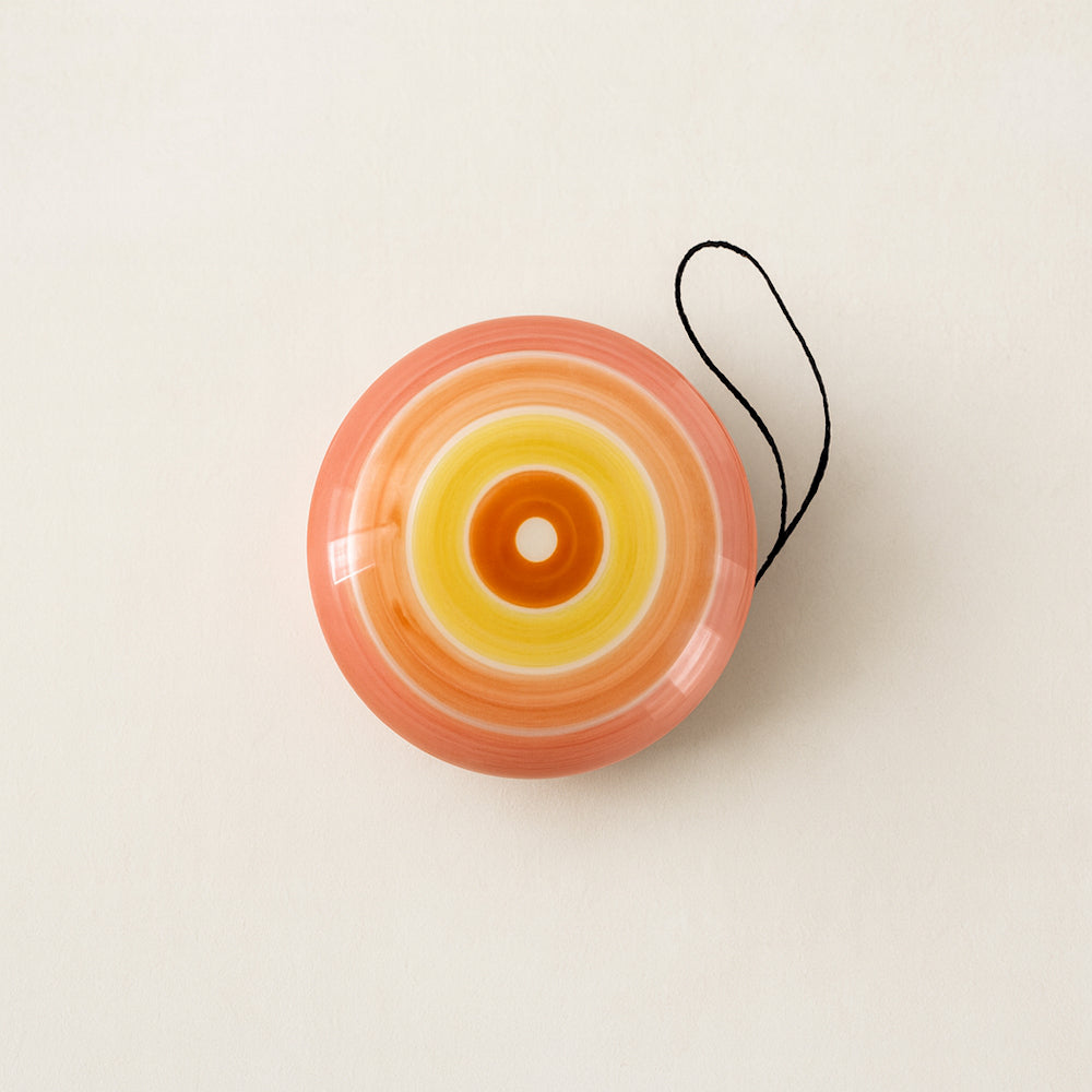 Yo-Yo Spago Di Terra in ceramica dipinta a mano fasce arancio Ø7x3,5 cm