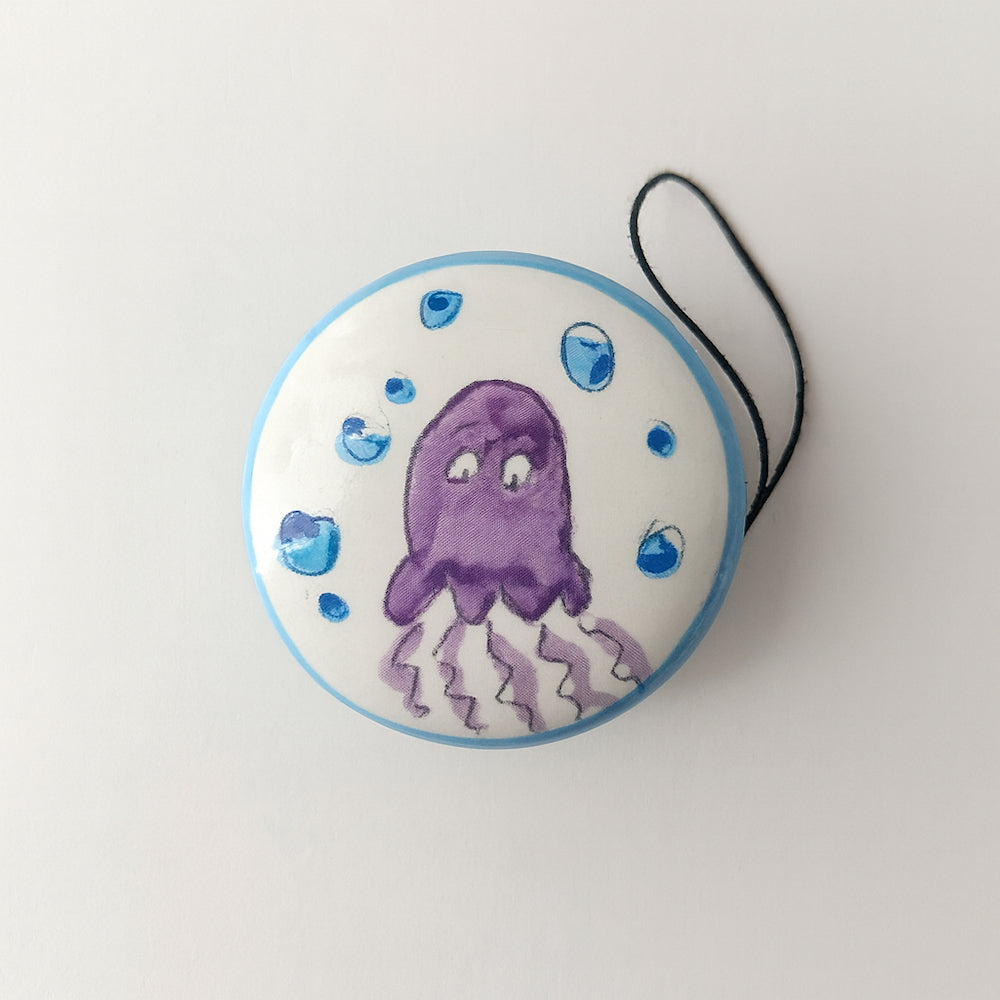 Yo-Yo Spago Di Terra in ceramica fantasia seppia Ø7x3,5 cm porta fortuna artigianale