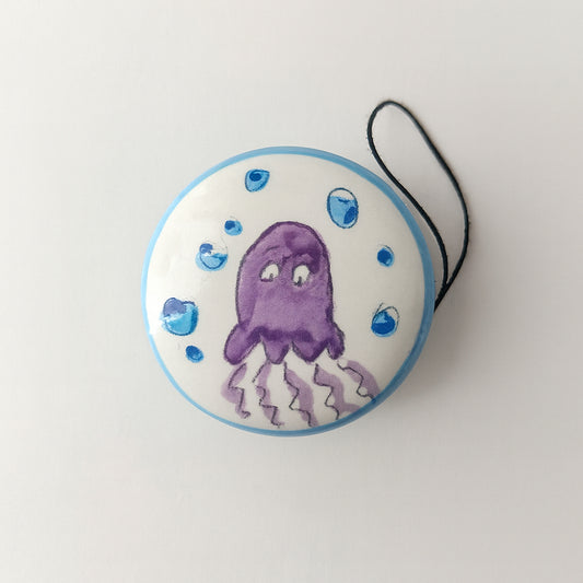 Yo-Yo Spago Di Terra in ceramica fantasia seppia Ø7x3,5 cm porta fortuna artigianale